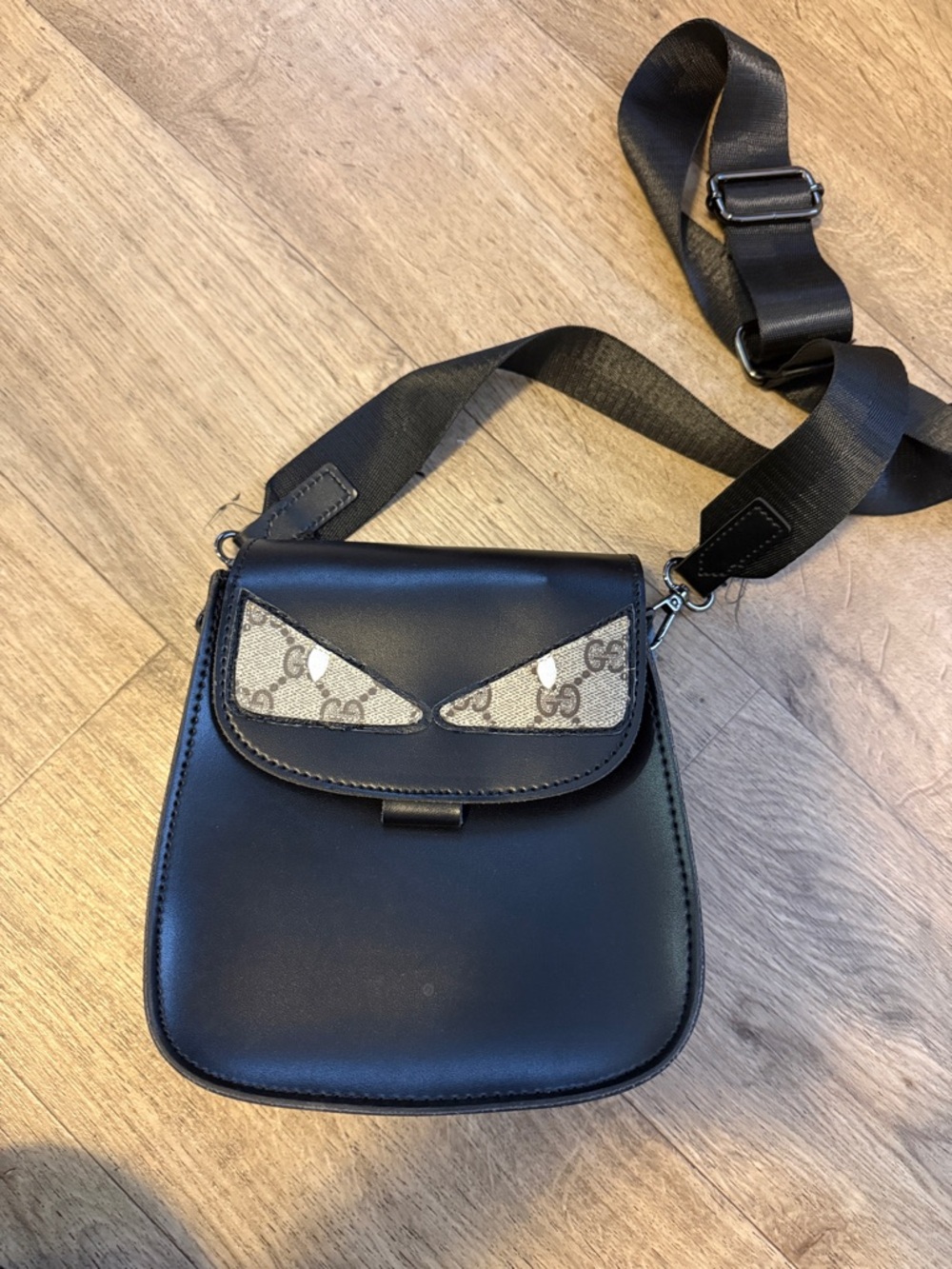 Black Leather Crossbody Bag with Signature Canvas Accent - Luxury Designer